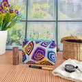 Petite trousse à maquillage en tissu wax multi-motifs blanc bleu et violet