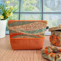 trousse à maquillage en velours côtelé orange et tissu wax motif vagues orange bleu et beige - fait main en France